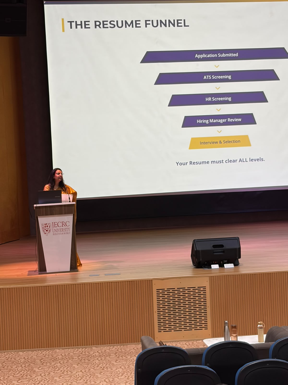 Harshita Agarwal presenting a resume workshop at JECRC University