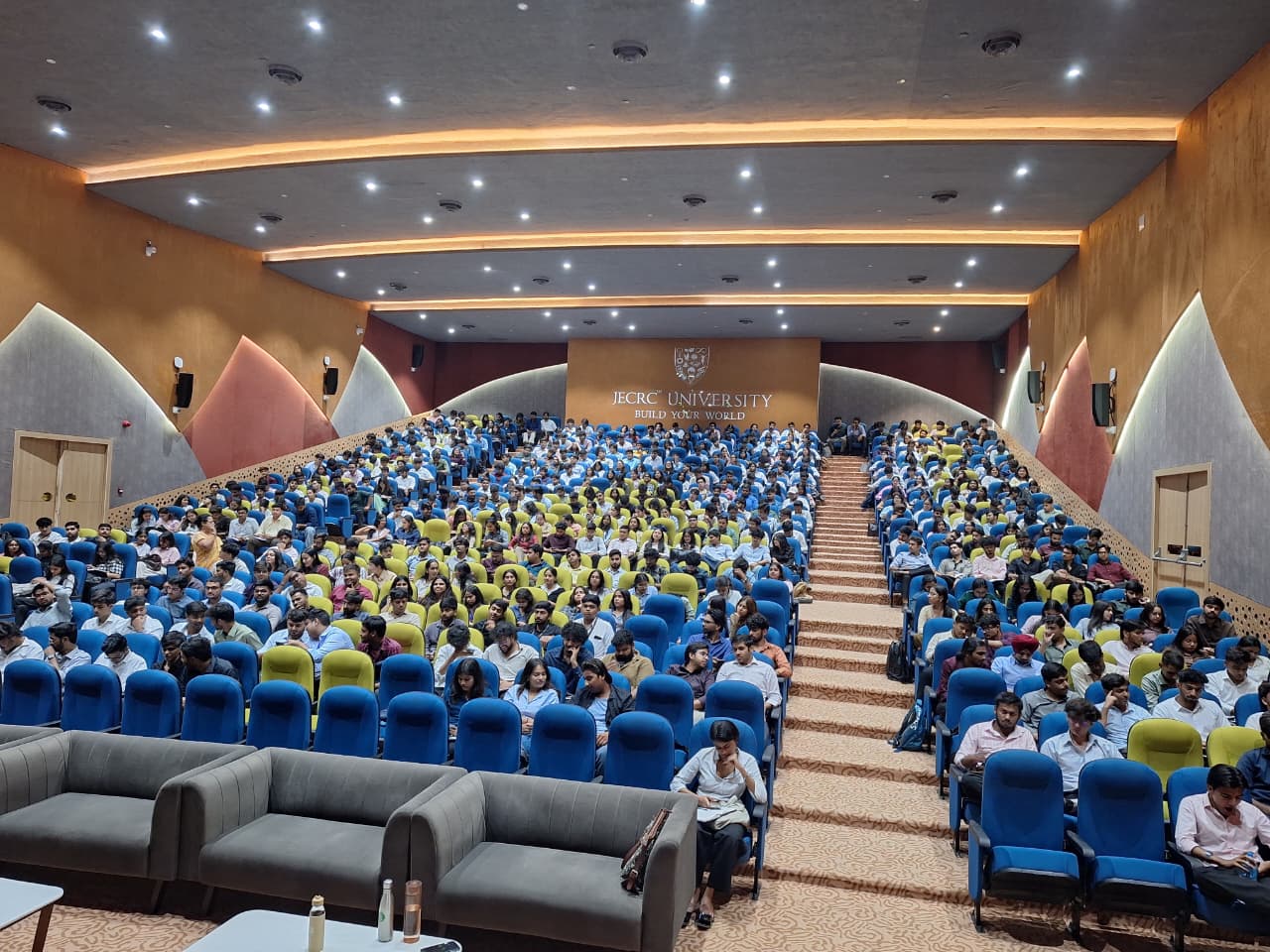 A full auditorium of students at a JECRC University session